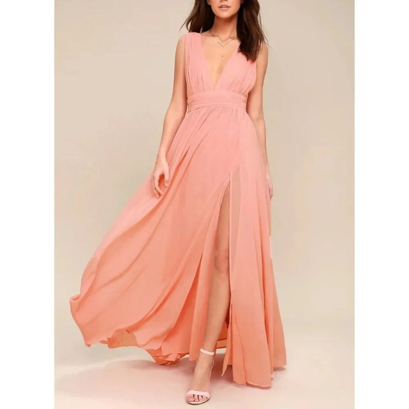 Woman wearing a peach-colored dress with a plain background