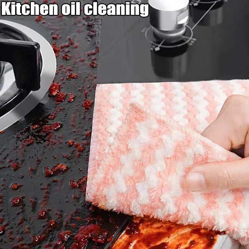 Cleaning a stove with a pink and white cloth, labeled 'Kitchen oil cleaning'.
