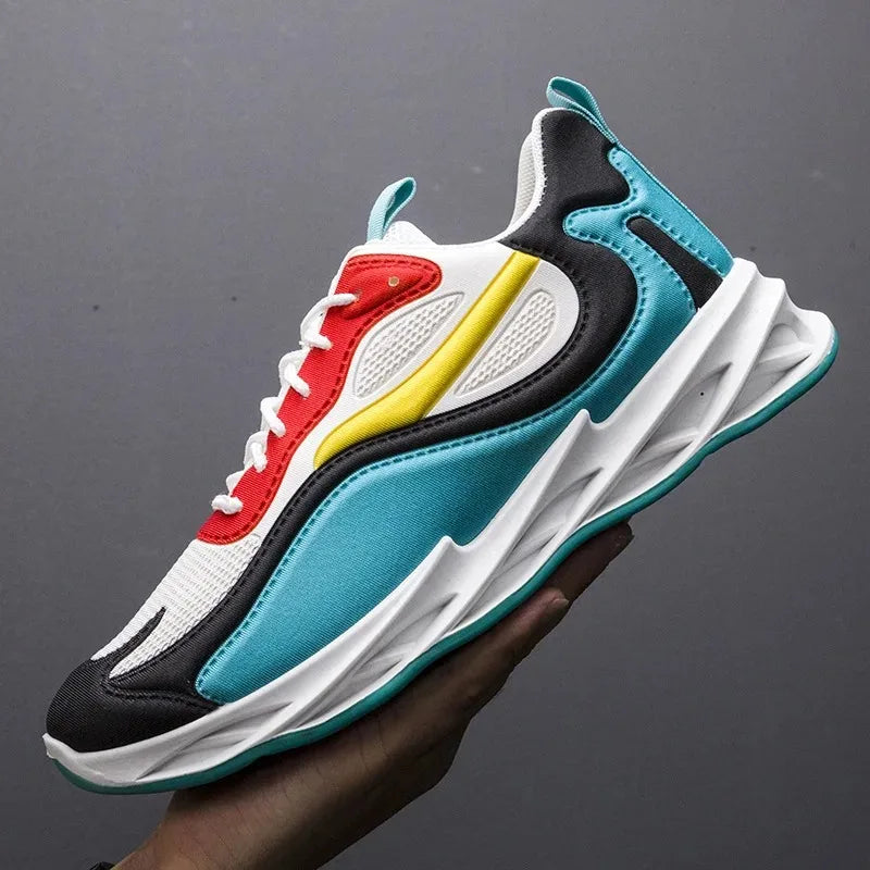 Multicolored sneaker held by a hand against a dark background