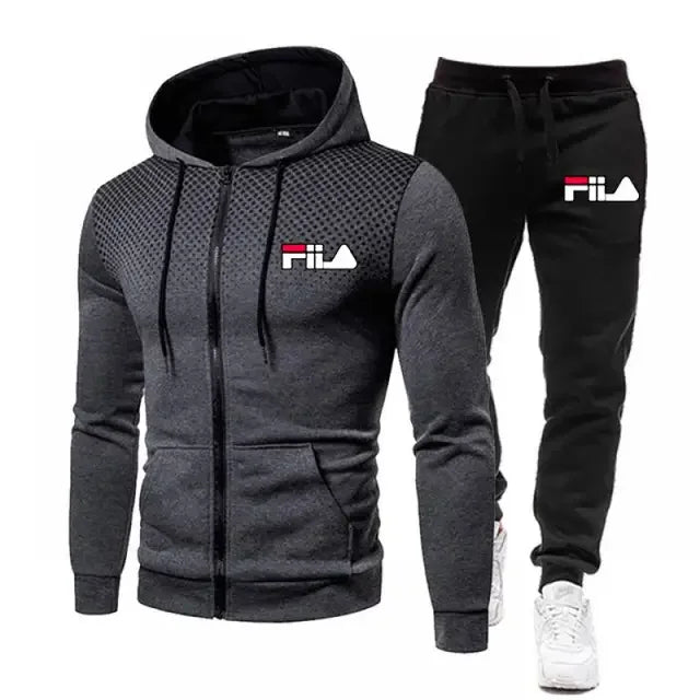 Gray hoodie and black pants with Fila logo on a white background
