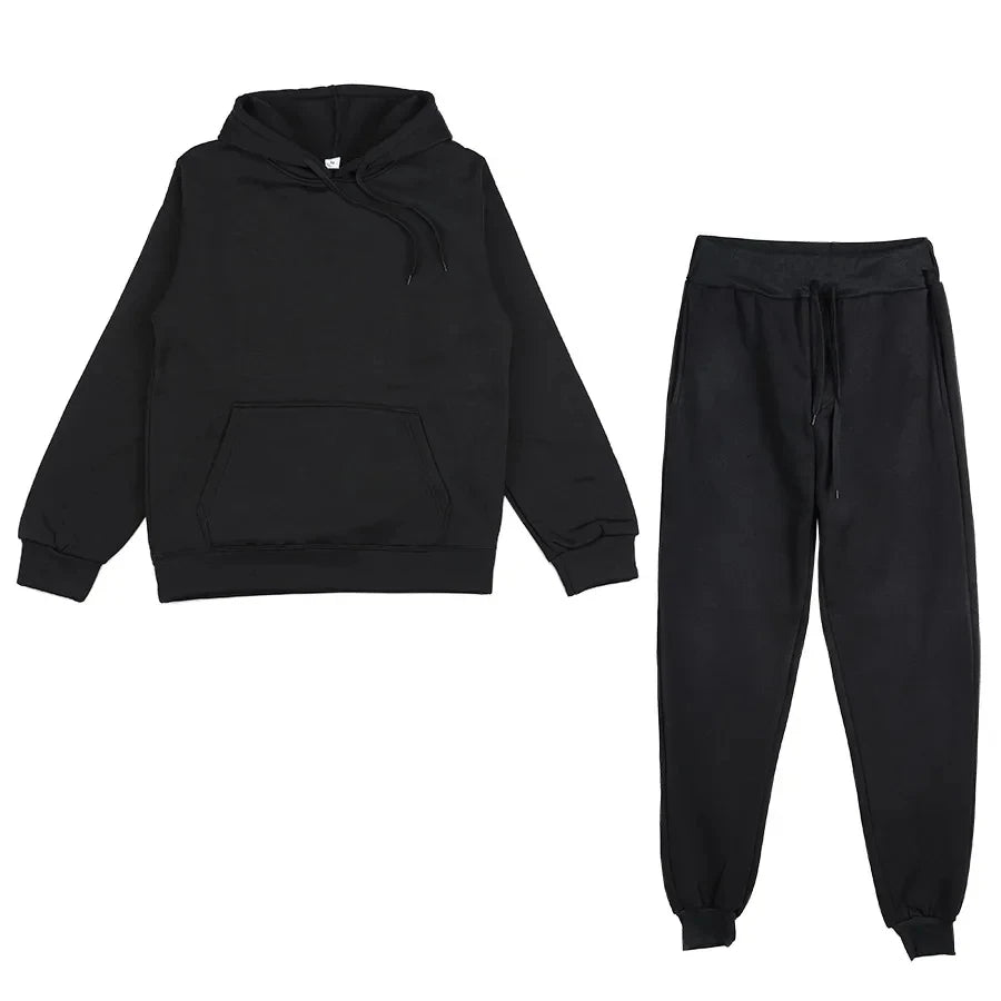 Black hoodie and black jogger pants on a white background