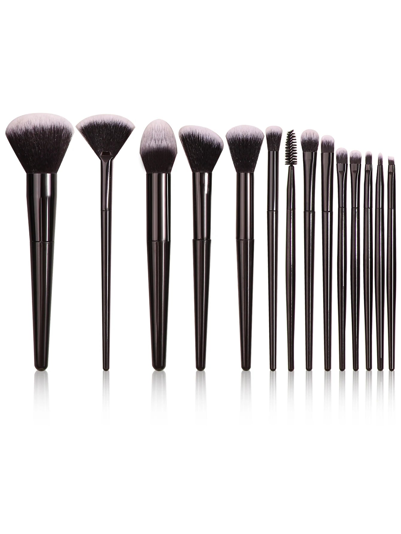 Set of makeup brushes with black handles on a white background