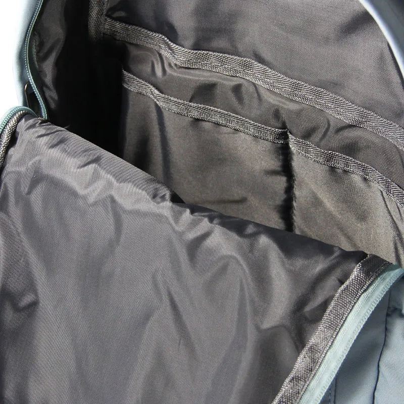 Close-up of a gray bag with visible stitching details