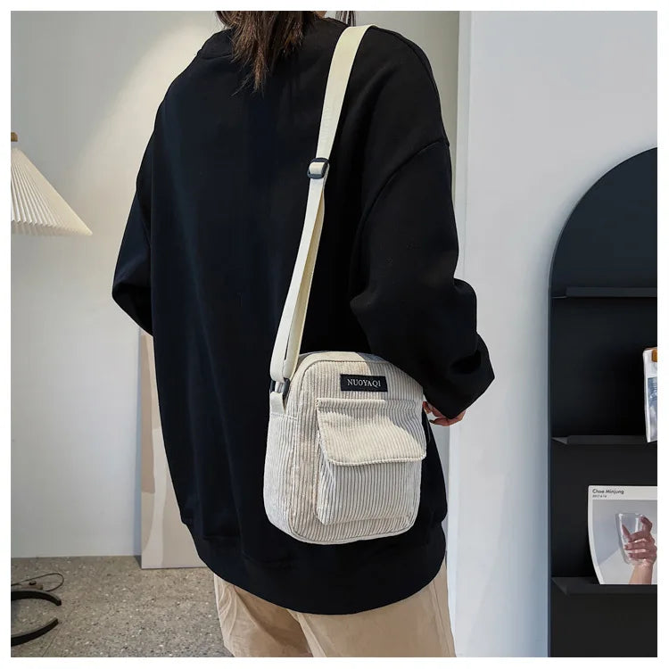 Striped corduroy fabric shoulder bag with zipper and crossbody strap, casual canvas tote for women beige