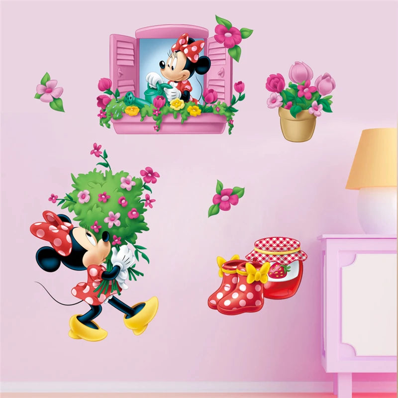 Wall stickers featuring cartoon characters and flowers on a pink wall.