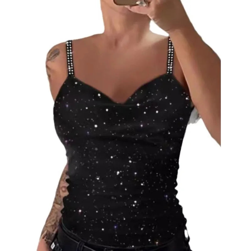 Black tank top with star pattern worn by a person on a white background