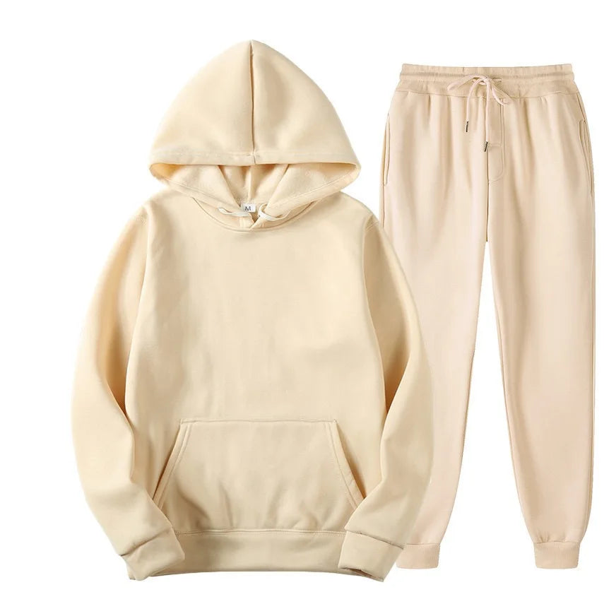 Beige hoodie and jogger pants set on a white background