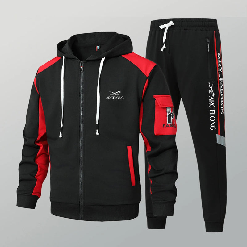 Black and red tracksuit with visible branding on a gray background