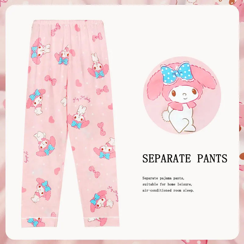 Pink pajama pants with cartoon character and bow pattern on a pink background