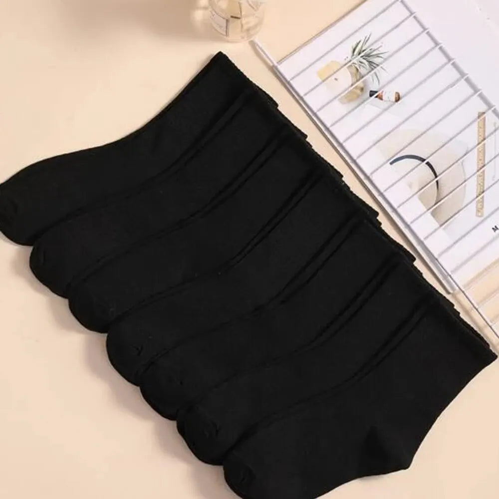 7 pairs of black and white mid-length breathable unisex socks for casual and sportswear-  seven black