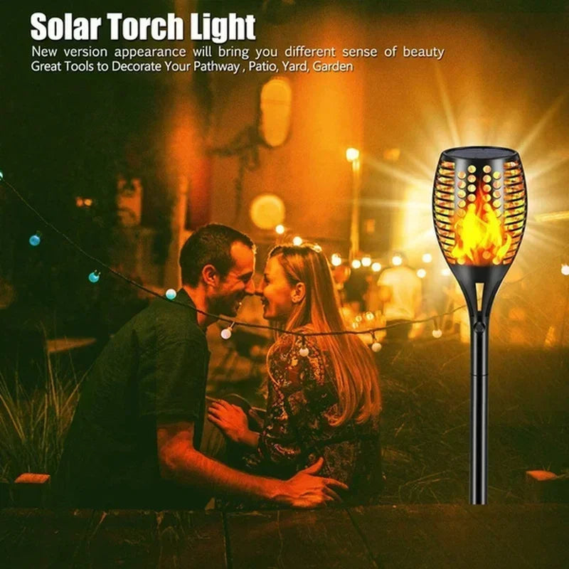 Waterproof solar flame torch lights for garden, patio, and path decoration. -outside