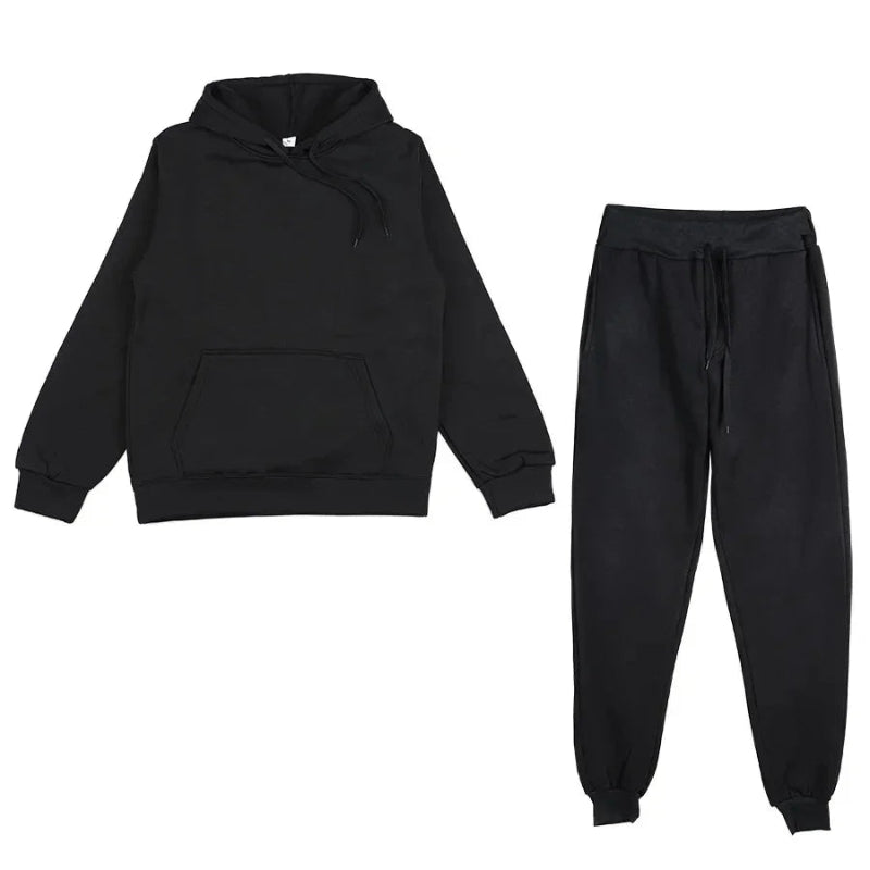 Black hoodie and black jogger pants on a white background