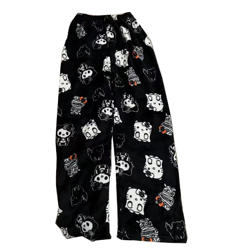 Black pajama pants with cartoon character pattern on a white background