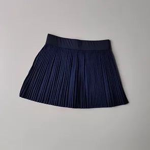 Navy pleated skirt on a light gray background