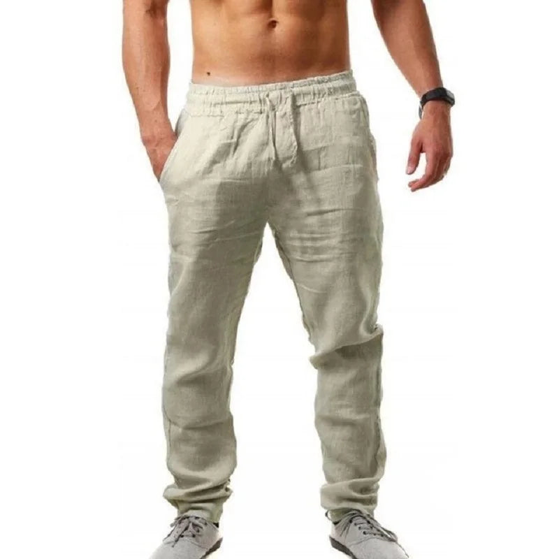 Light-colored jogger pants worn by a person on a white background