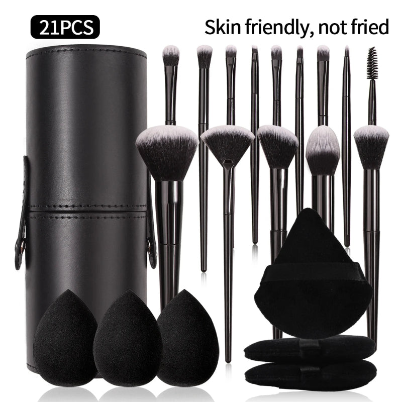 Makeup brush set with black holder and sponges, labeled '21PCS' and 'Skin friendly, not fried'.