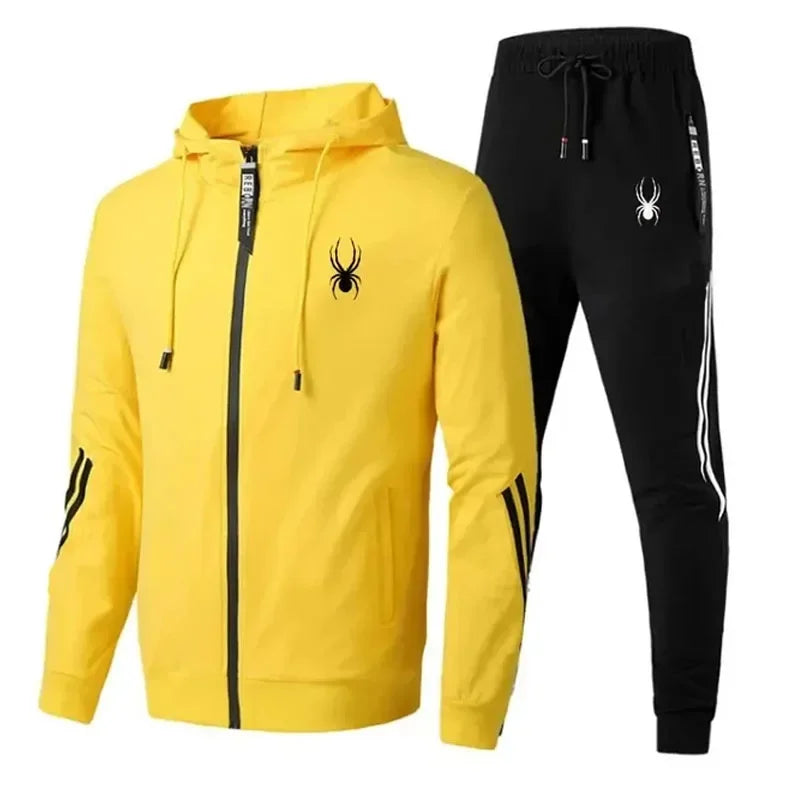 Yellow tracksuit with black spider logo on a white background