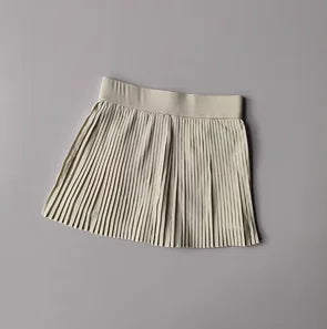 Pleated skirt on a gray background
