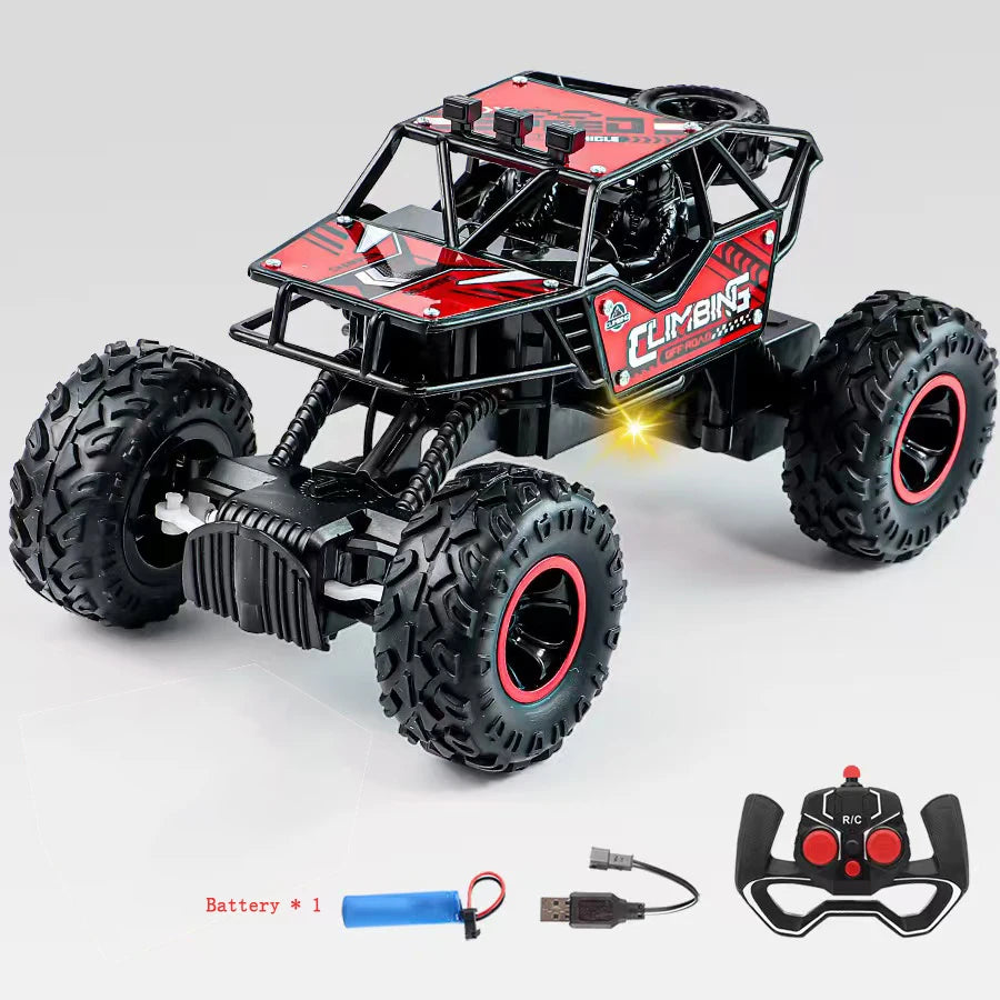 Toy monster truck with large wheels and remote control on a white background