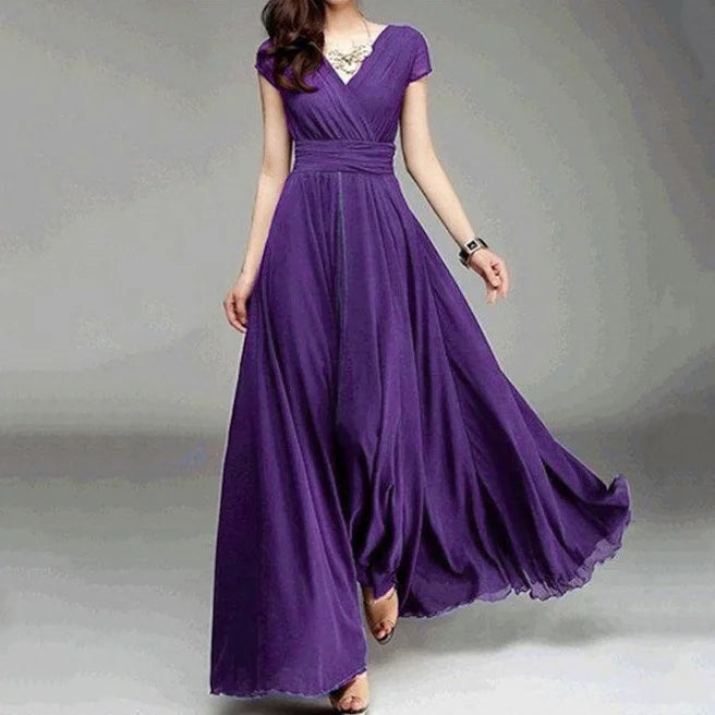 Purple evening gown on a plain background