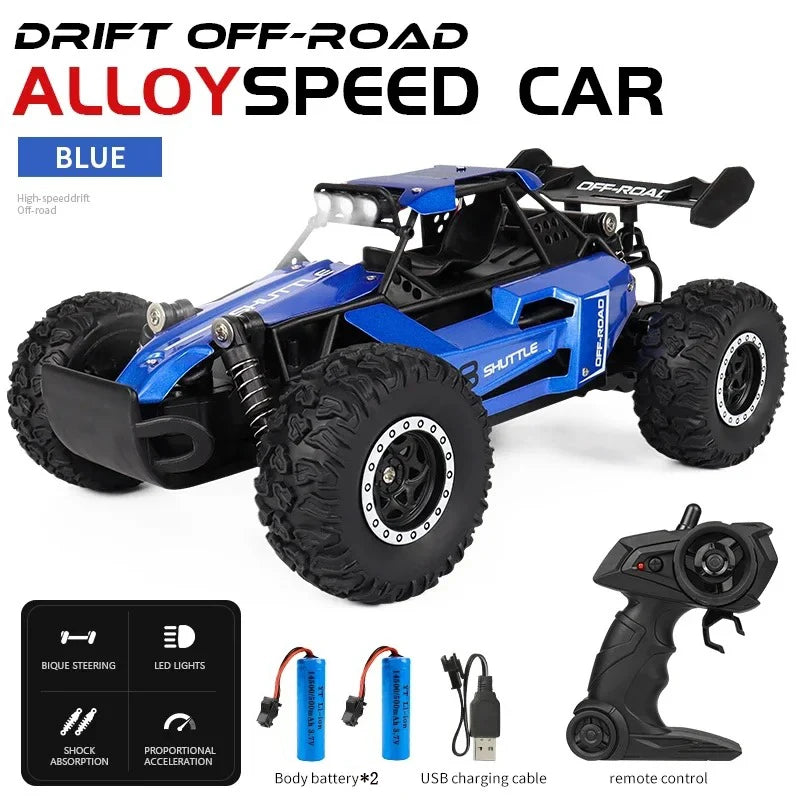 Blue alloy speed car with remote control and accessories on a white background