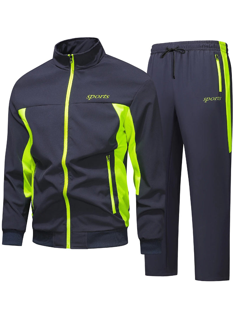 Navy tracksuit with green accents on a white background
