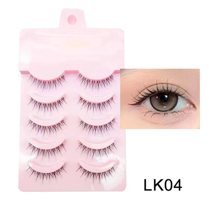 Set of false eyelashes with a pink case and an inset showing an eye wearing the lashes.