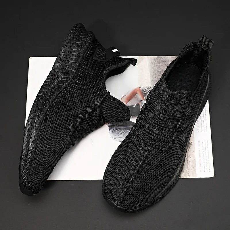 Men’s breathable knit lace-up sneakers with non-slip sole on outdoor trail