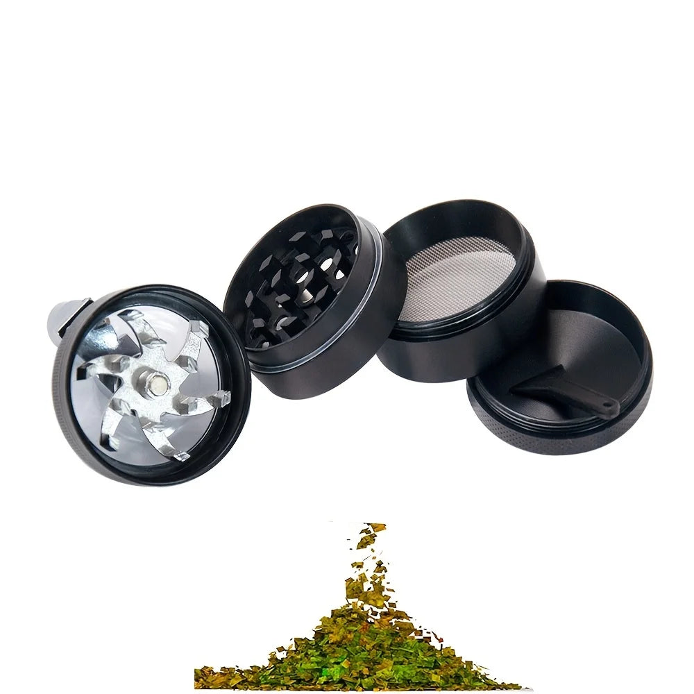 Black and silver herb grinder with a pile of green herbs on a white background