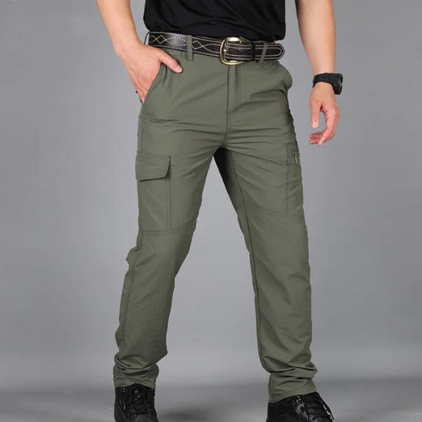 Men’s summer cargo pants in streetwear style, designed for trekking, hiking, and outdoor work with multiple pockets and breathable fabric - green