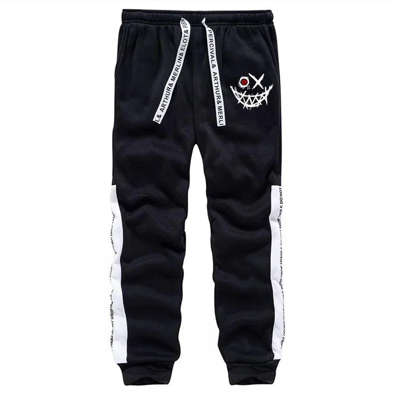 Black sweatpants with white accents and a graphic design on a white background