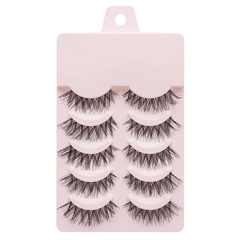 Set of false eyelashes on a pink card with a hook