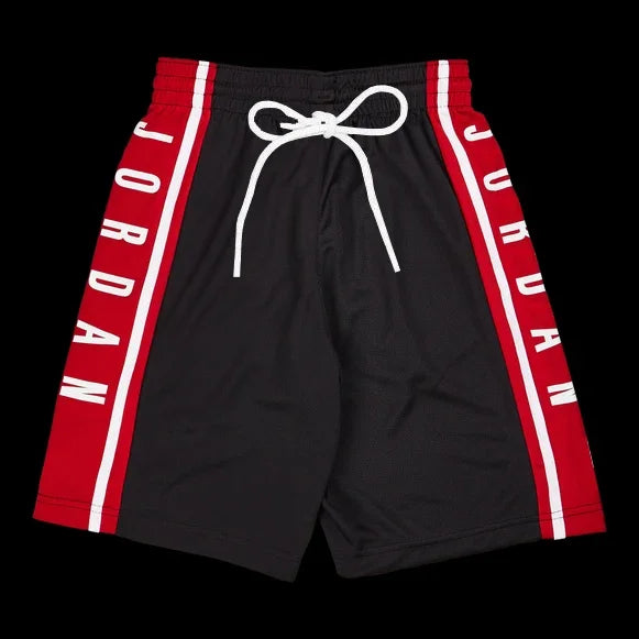 Black shorts with red and white Jordan branding on a black background