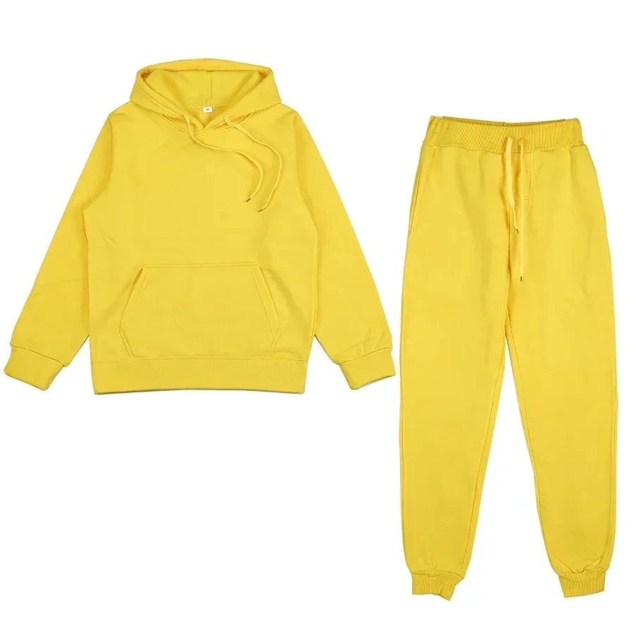 Yellow hoodie and pants set on a white background