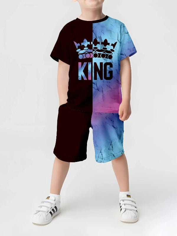 A child wearing a red and black outfit with a 3D crown print.