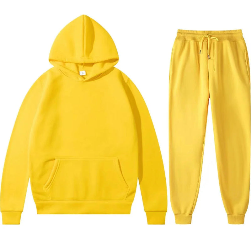 Yellow hoodie and jogger pants set on a white background
