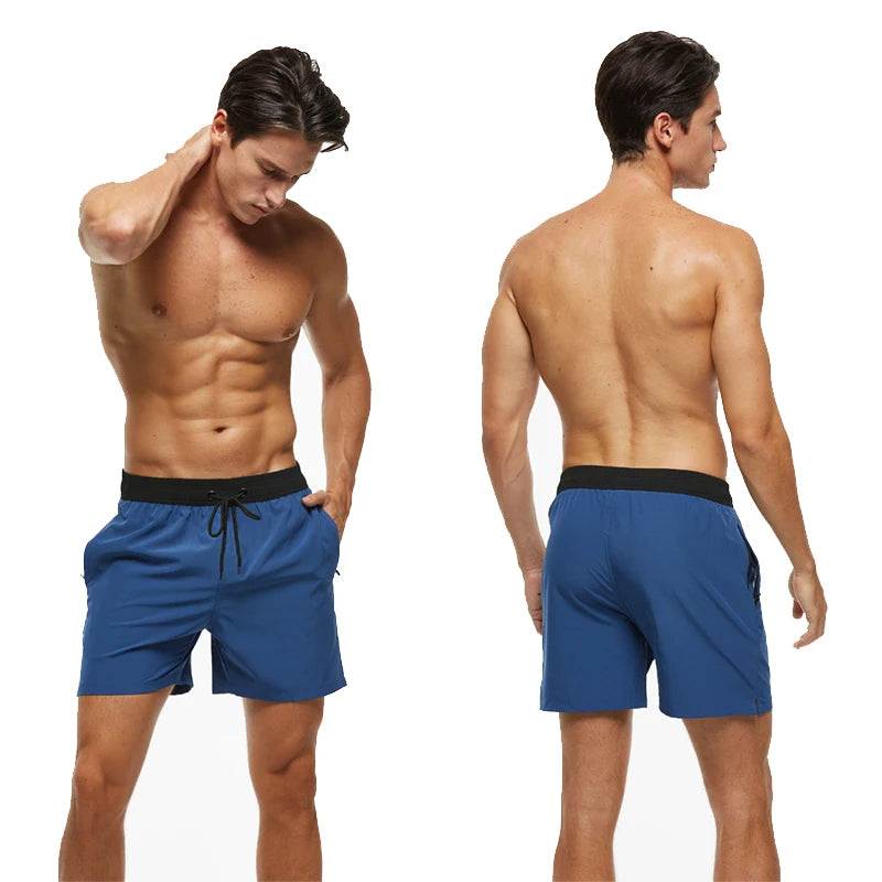 Man wearing blue shorts with black waistband, shown from front and back on a white background
