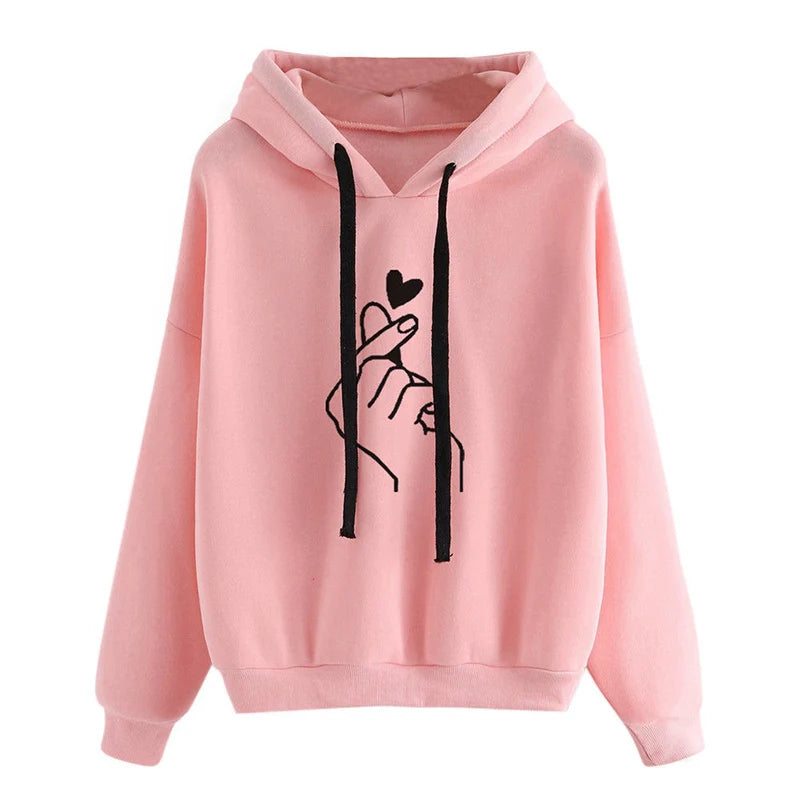 Pink hoodie with black graphic design on a white background