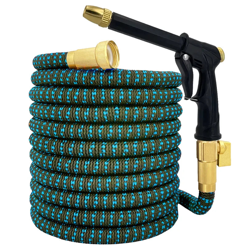 Coiled garden hose with a nozzle on a white background