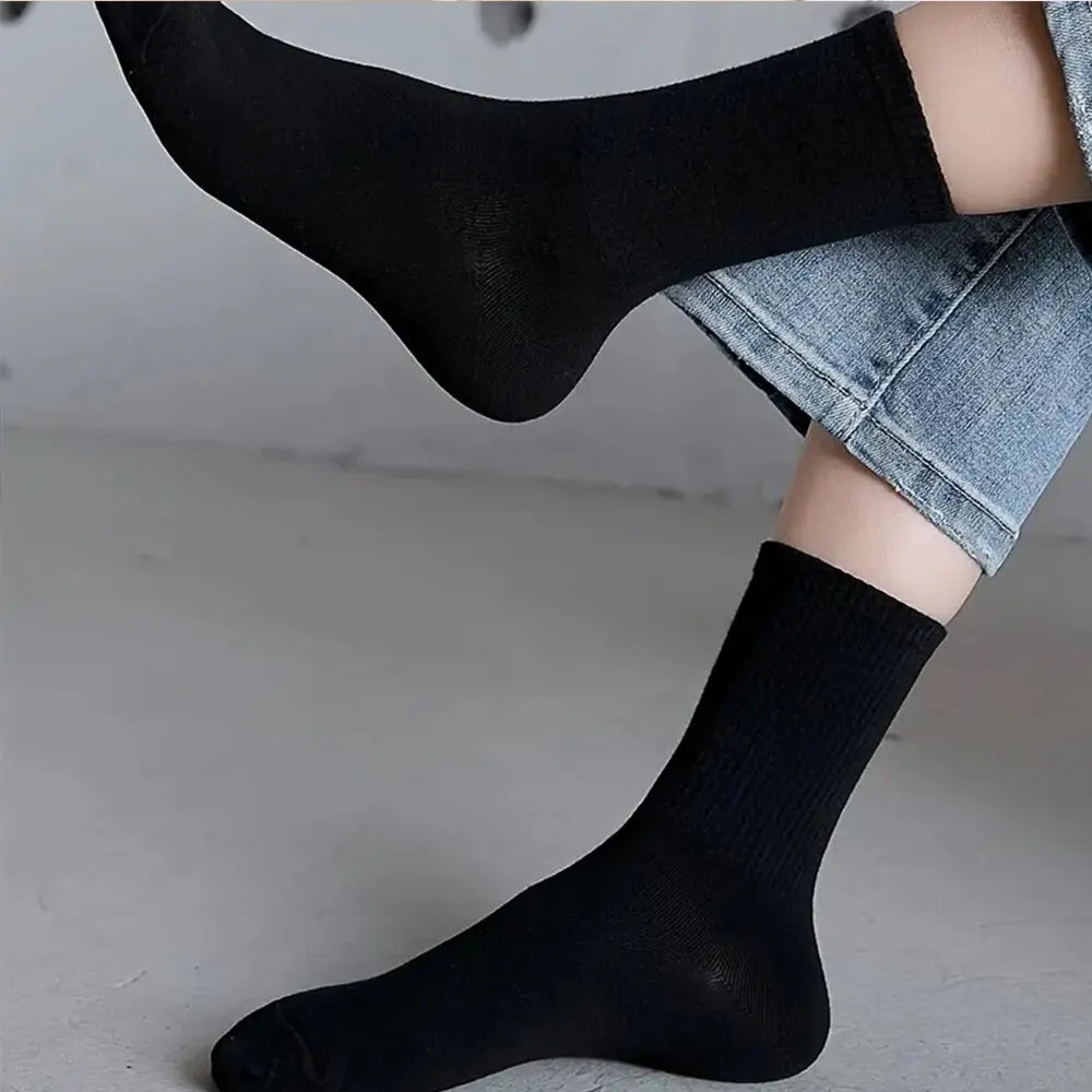 7 pairs of black and white mid-length breathable unisex socks for casual and sportswear - black