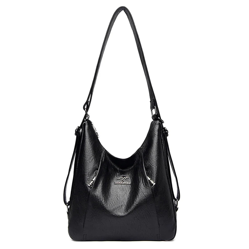 Black handbag with a visible brand logo on a white background