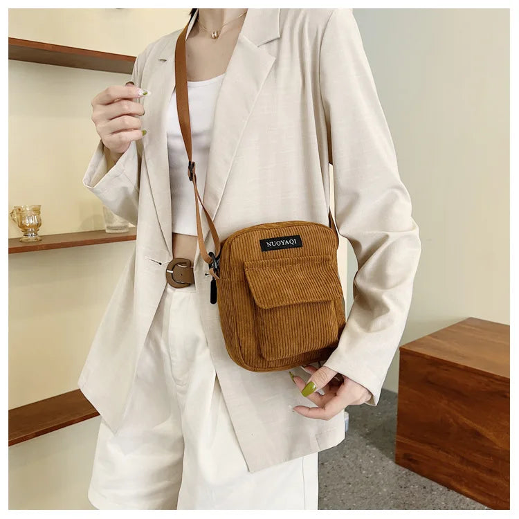 Striped corduroy fabric shoulder bag with zipper and crossbody strap, casual canvas tote for women brown