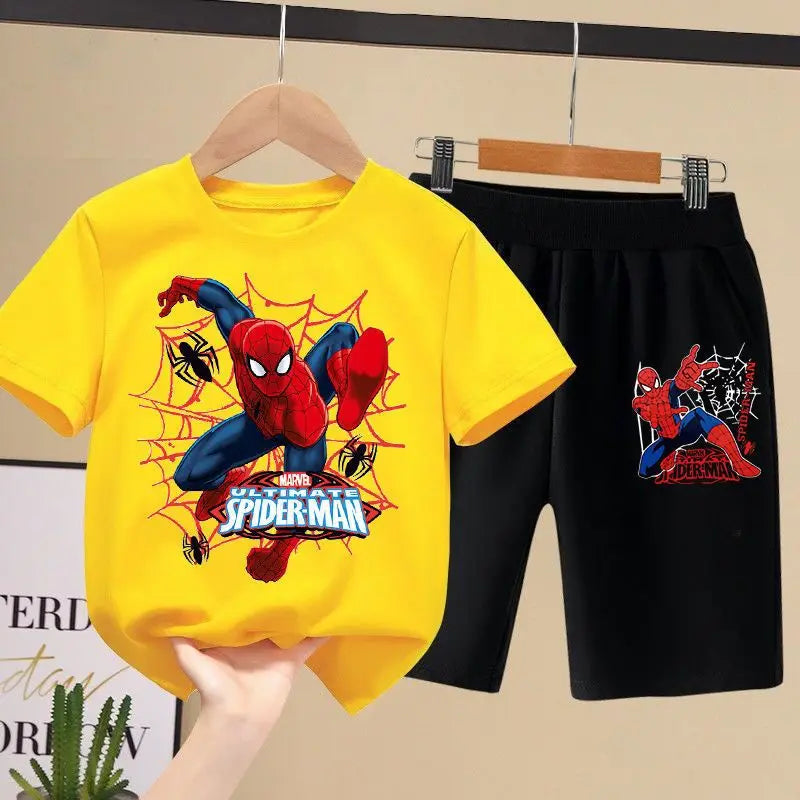 Yellow t-shirt with Spider-Man design and black shorts with Spider-Man design on a hanger.