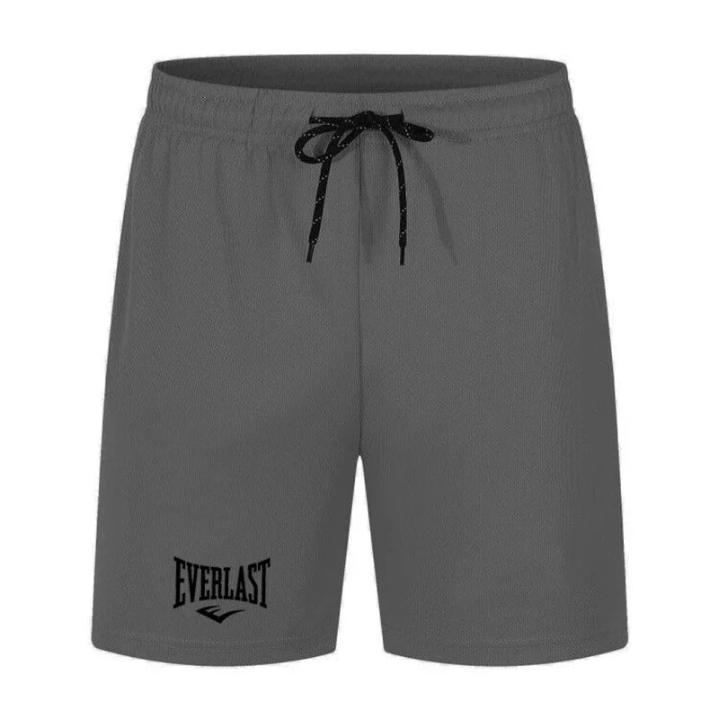 Gray shorts with a black drawstring and Everlast logo on a white background