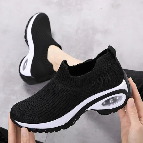 Side view of casual sport sneakers featuring air cushion sole - 1