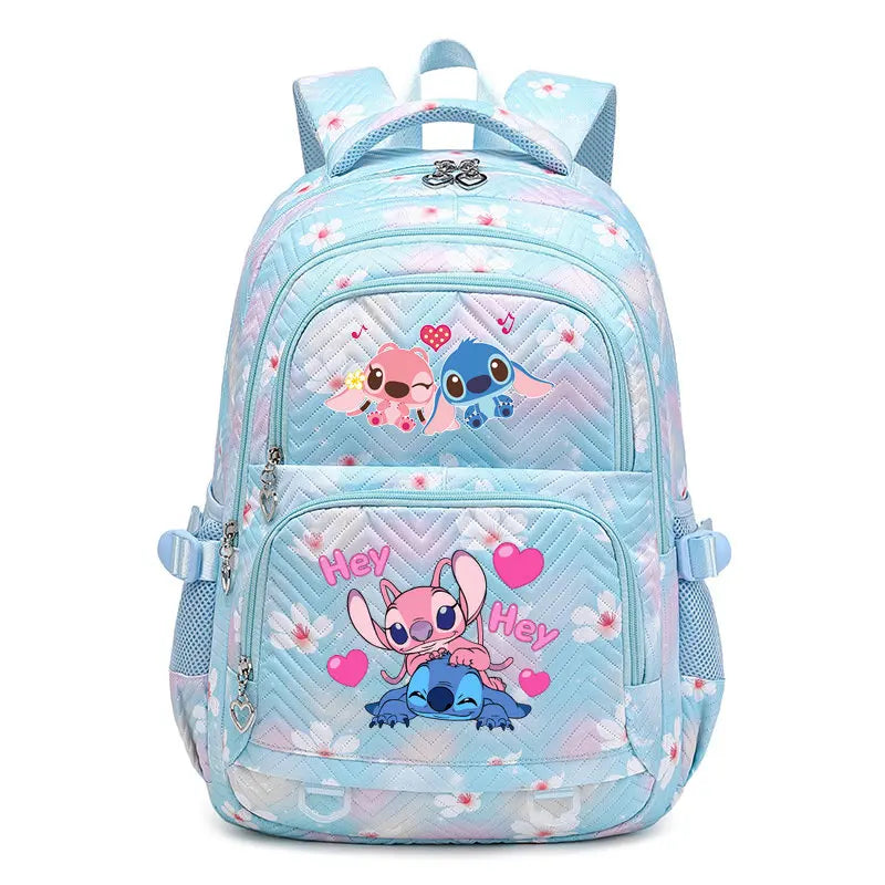 Light blue backpack with cartoon character design on a white background
