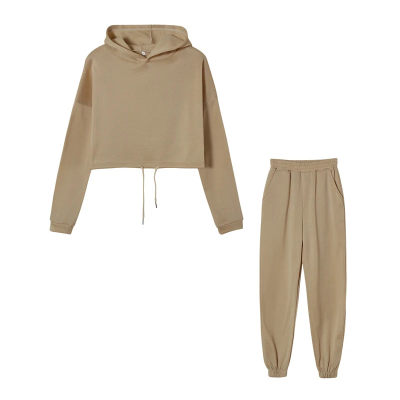 Women’s fashion two-piece sportswear set with long sleeves and high-waist casual pants in neutral tones beige