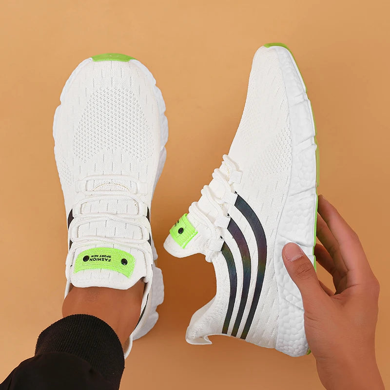 sneakers designed with breathable mesh and cushioned soles for all-day comfort in sports and casual wear. white