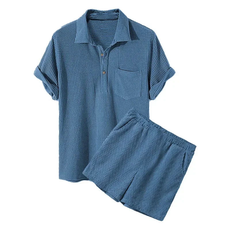 Blue checkered shirt and shorts set on a white background