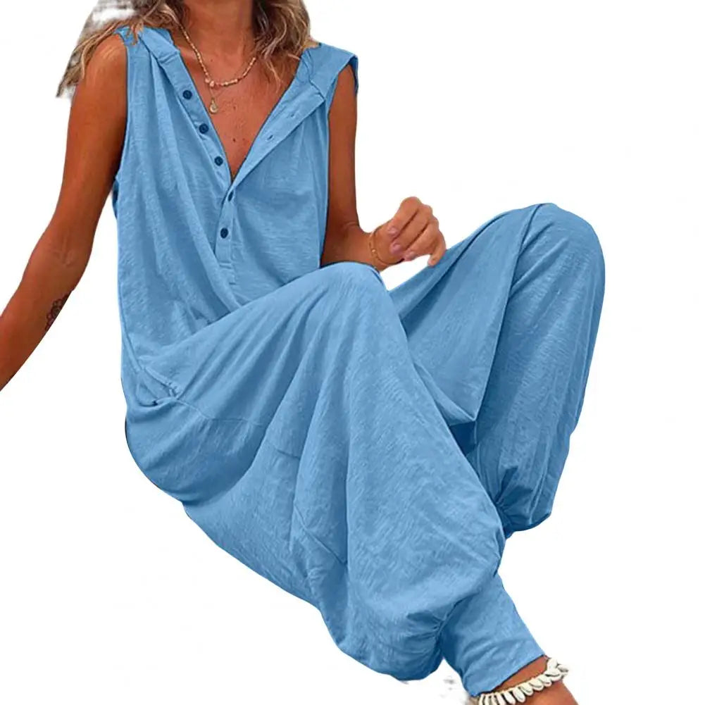 Woman wearing a blue jumpsuit on a white background